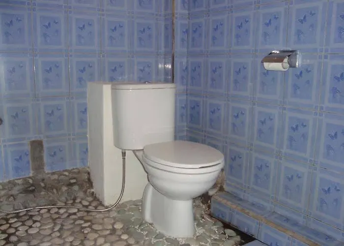 Habitación en casa particular Taman Ayu Mitra Reddoorz *