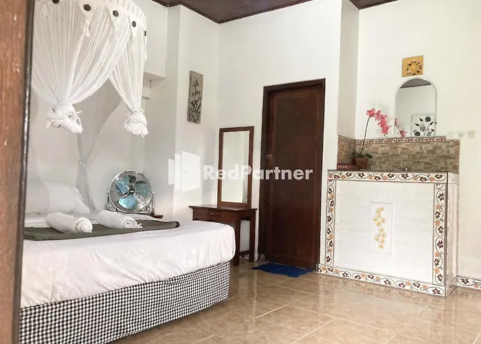 Habitación en casa particular Taman Ayu Mitra Reddoorz *